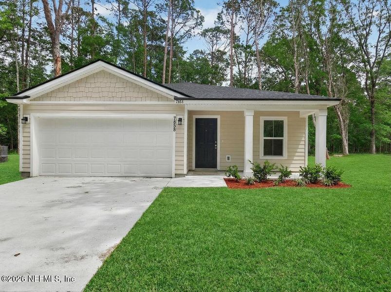 Front exterior of a new home in , Jacksonville, FL, highlighting curb appeal (Image 29).