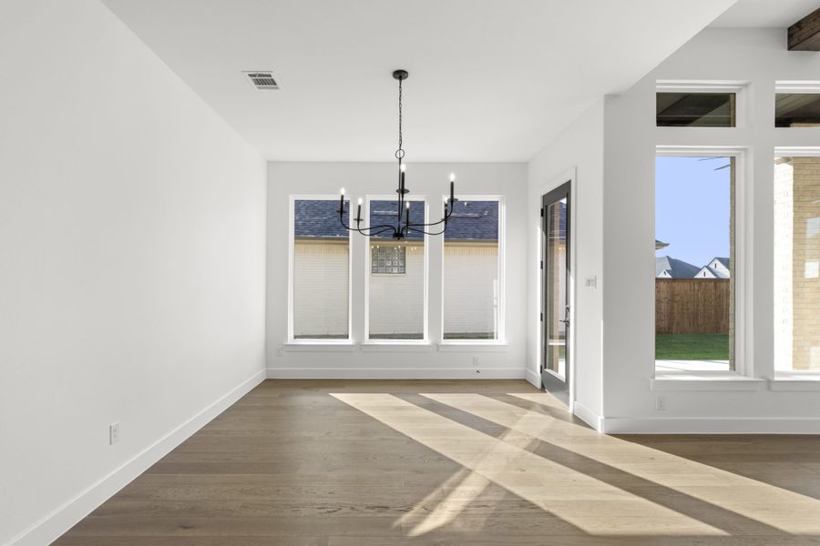Representative unfurnished interior of a home built from the 5521 by Tradition Homes in Windsong Ranch, Prosper (Image 15).