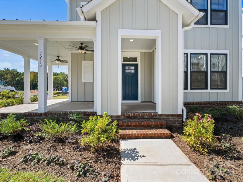 Exterior details and patio area of a home in The River District - Pioneer Collection, Charlotte (Image 3).