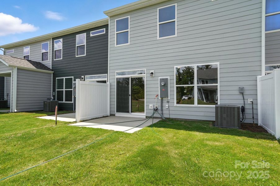 Front exterior of a new home in Harrisburg Village Townhomes, Harrisburg, NC, highlighting curb appeal (Image 18).
