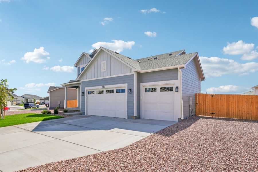 Front exterior of a new home in The Glen, Colorado Springs, CO, highlighting curb appeal (Image 21). Front exterior of a new home in The Glen, Colorado Springs, CO, highlighting curb appeal (Image 21).
