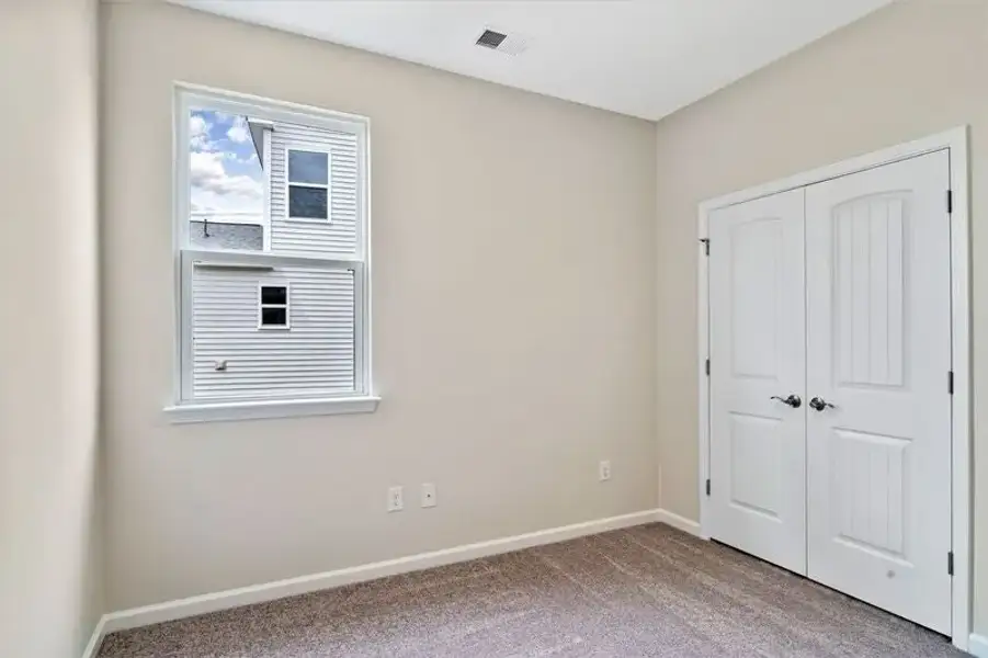 Spacious, unfurnished interior of a new home in Heritage Park at Longs, Longs (Image 19).
