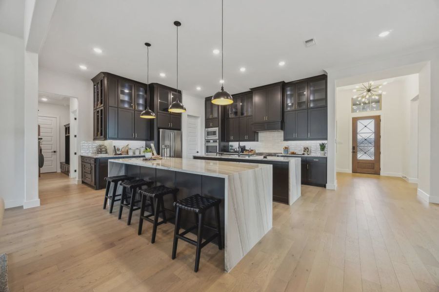 Representative furnished interior of a home built from the Tirana by Chesmar Homes in The Vines, Haslet (Image 5). Representative furnished interior of a home built from the Tirana by Chesmar Homes in The Vines, Haslet (Image 5).