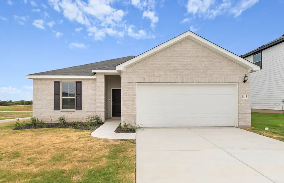 Front exterior of a new home in County View, Temple, TX, highlighting curb appeal (Image 2). Front exterior of a new home in County View, Temple, TX, highlighting curb appeal (Image 2).