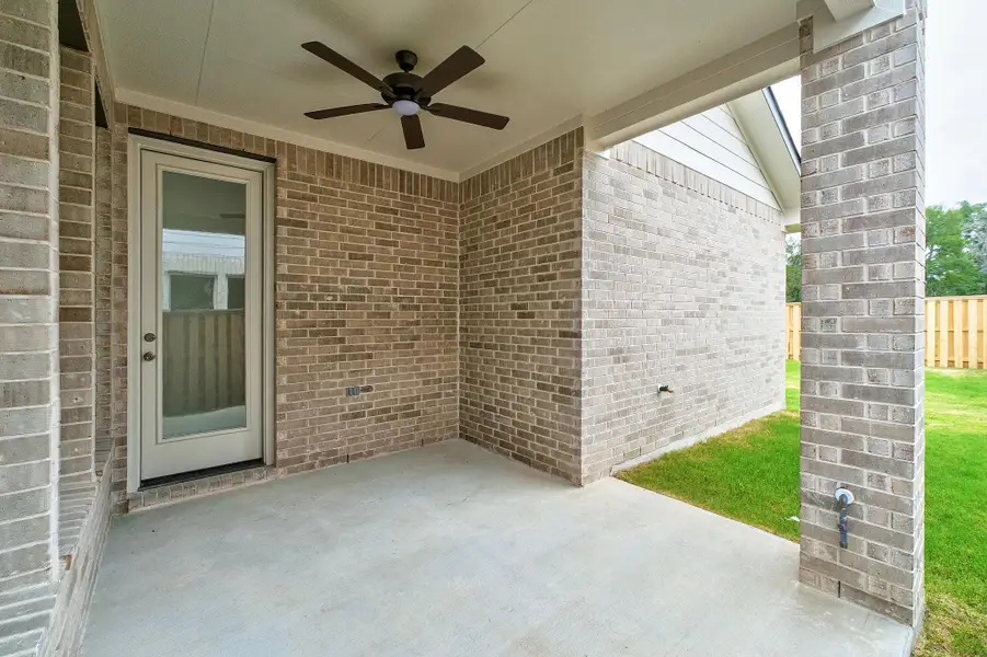 Exterior details and patio area of a home in Parmer Ranch, Georgetown (Image 27). Exterior details and patio area of a home in Parmer Ranch, Georgetown (Image 27).