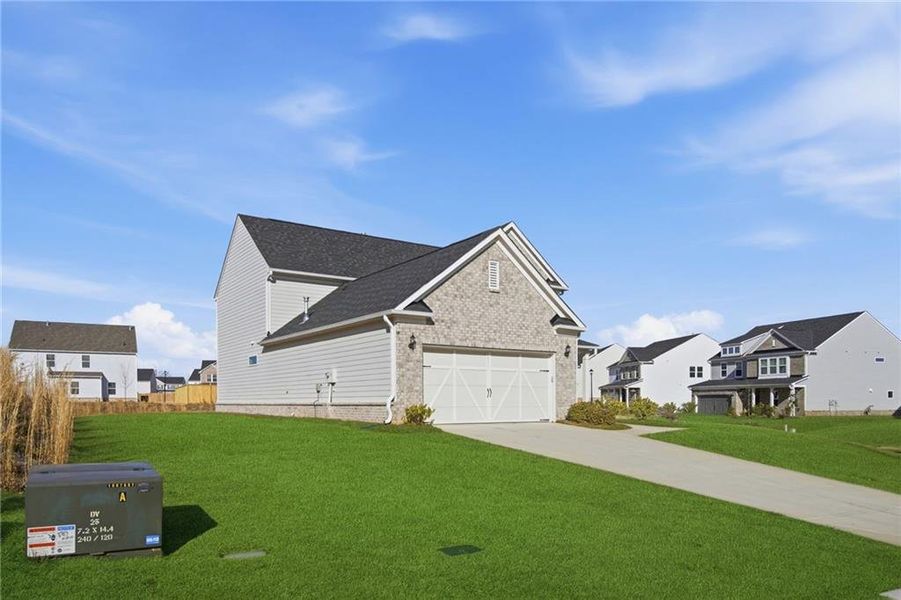 Front exterior of a new home in , Dawsonville, GA, highlighting curb appeal (Image 2). Front exterior of a new home in , Dawsonville, GA, highlighting curb appeal (Image 2).
