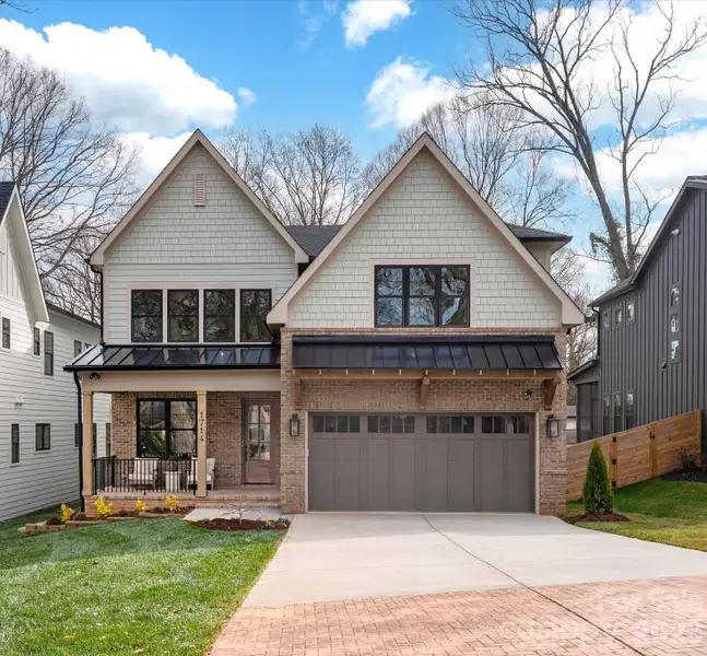 Front exterior of a new home in , Charlotte, NC, highlighting curb appeal (Image 1). Front exterior of a new home in , Charlotte, NC, highlighting curb appeal (Image 1).