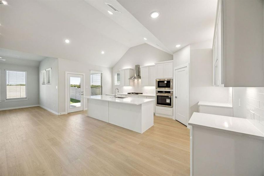 Kitchen in the Wimbledon home plan by Trophy Signature Homes – REPRESENTATIVE PHOTO Kitchen in the Wimbledon home plan by Trophy Signature Homes – REPRESENTATIVE PHOTO