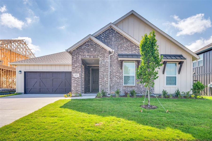 Front exterior of a home in the Sierra Vista at Kelly Ranch community, located in Aledo, TX (Image 5).