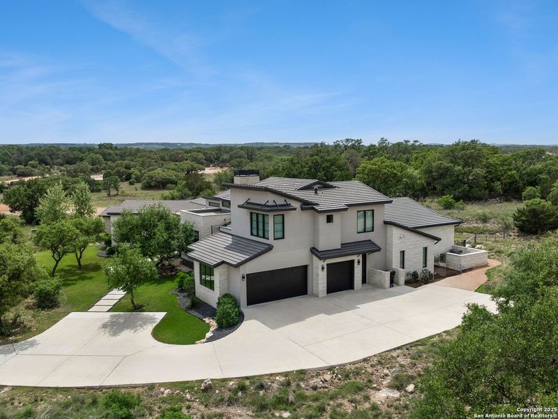 Front exterior of a new home in , Boerne, TX, highlighting curb appeal (Image 25).
