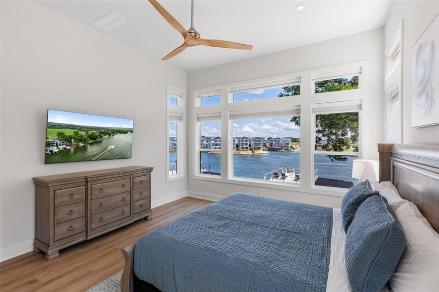 Primary Bedroom featuring water views. Primary Bedroom featuring water views.