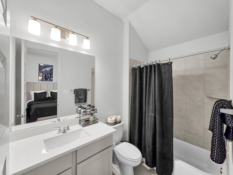 Furnished interior view inside a new home in Artavia, Conroe (Image 17).