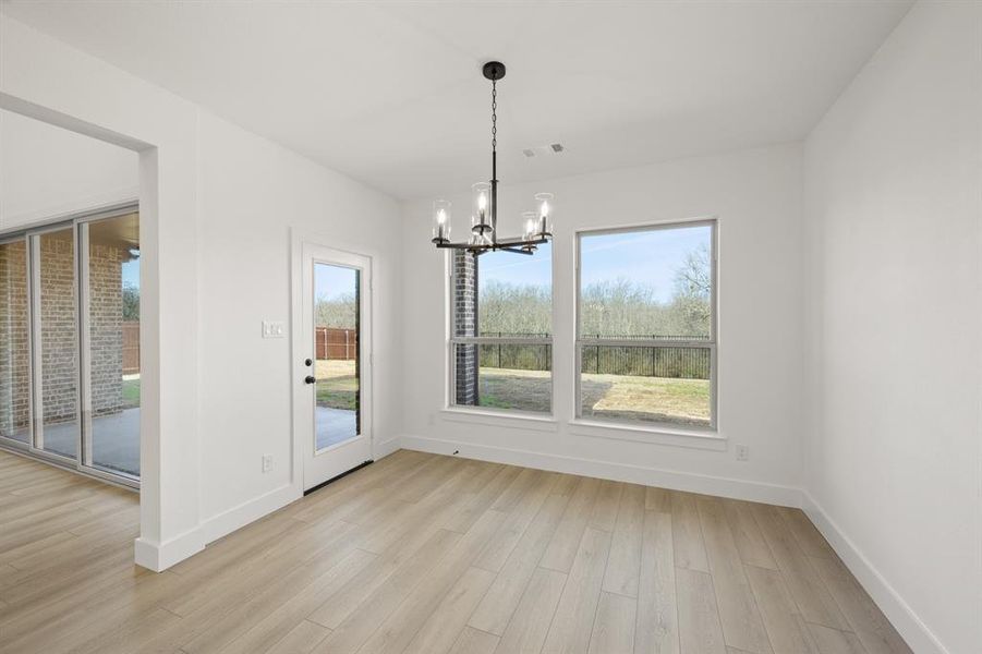 Spacious, unfurnished interior of a new home in High Country, Burleson (Image 36).