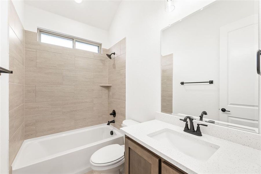 Furnished interior view inside a new home in Stone River Glen 60s, Royse City (Image 7).