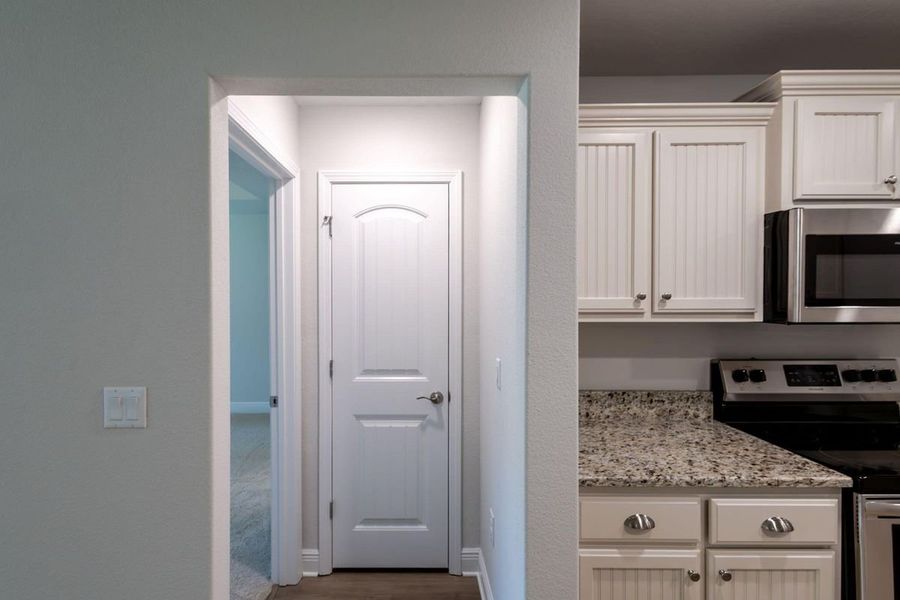 Representative furnished interior of a home built from the 2005 by Adams Homes in Parkland Place, Pace (Image 6).