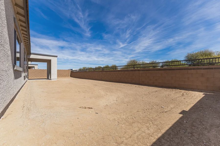 Exterior details and patio area of a home in Valencia at Granite Vista, Waddell (Image 23).