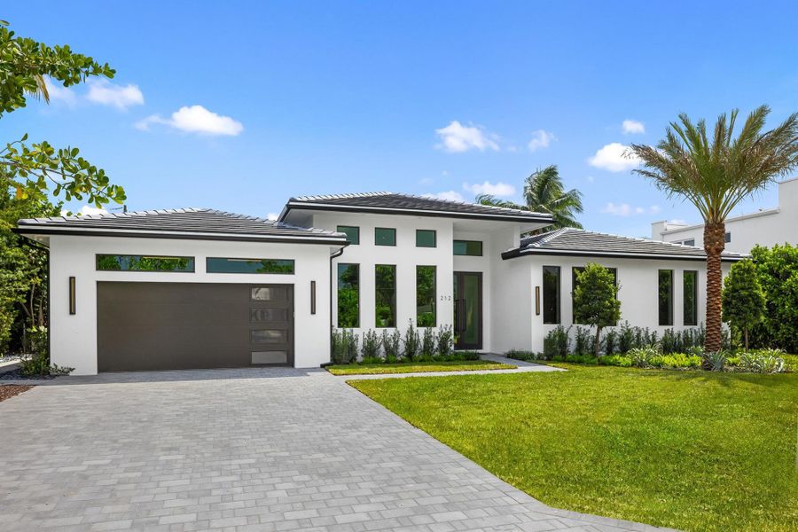 Front exterior of a new home in , Delray Beach, FL, highlighting curb appeal (Image 2).