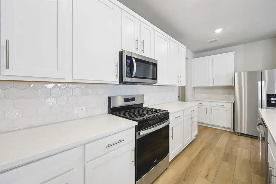 Photo is not of the actual home, but is an inspirational photo of builder’s model home and may depict options, furnishings, and/or decorator features that are not included.