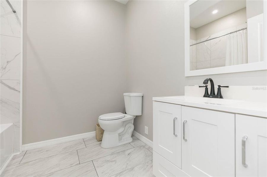 Furnished interior view inside a new home in , Dade City (Image 7).