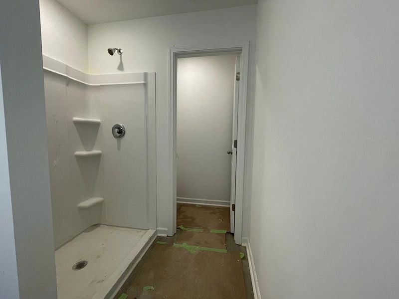 Primary Bath featuring the AW Collection® Minimalist - Sleek finishes and dramatic contrasts shine. Primary Bath featuring the AW Collection® Minimalist - Sleek finishes and dramatic contrasts shine.