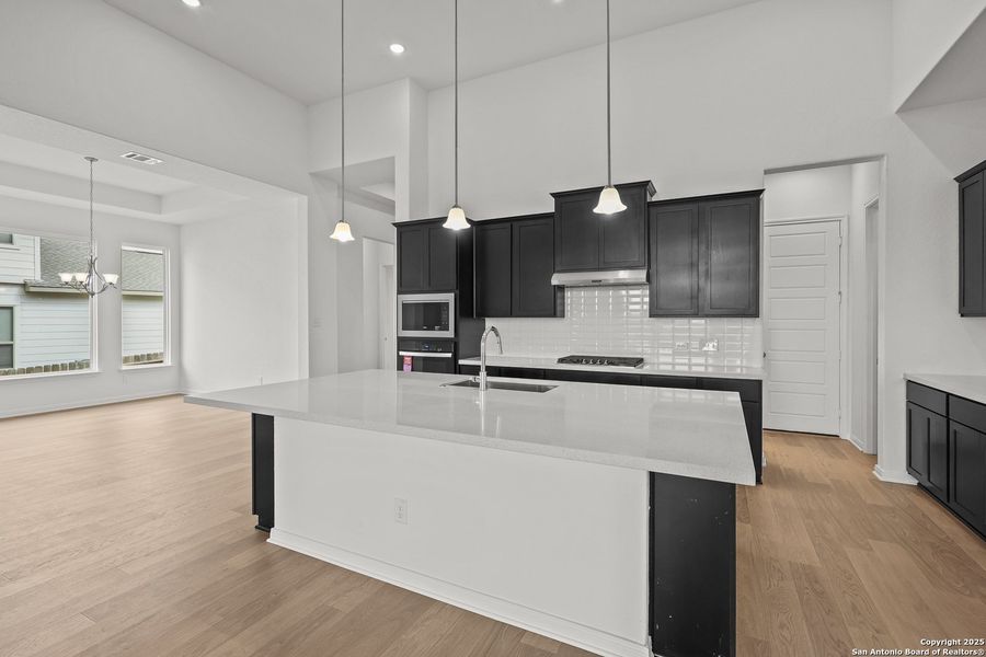 Furnished interior view inside a new home in Homestead 75', Schertz (Image 13).