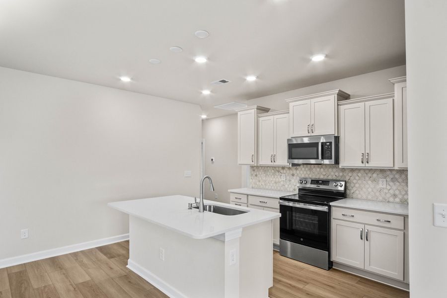 Furnished interior view inside a new home in Coastal Club of the Carolinas, Calabash (Image 6).