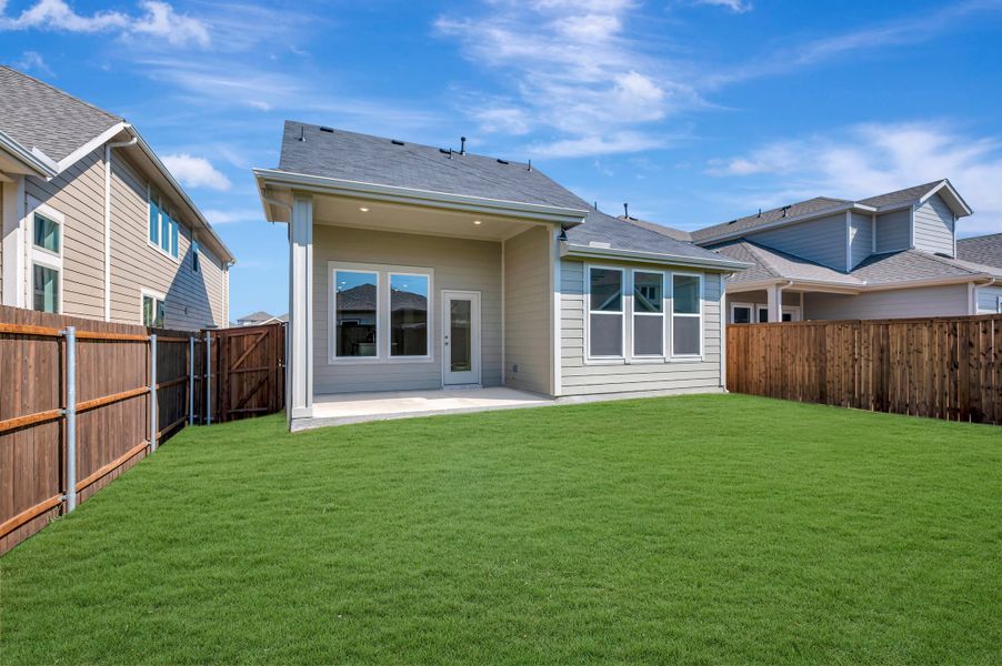Exterior details and patio area of a home in The Meadows, Denton (Image 17).
