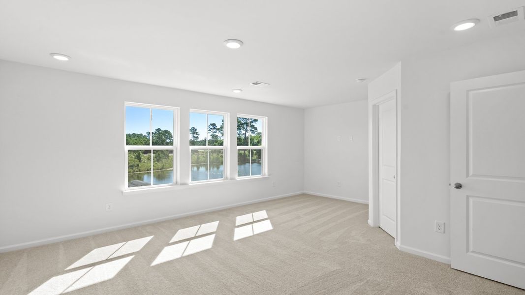 Furnished interior view inside a new home in Townes at Carolina Forest, Myrtle Beach (Image 8). Furnished interior view inside a new home in Townes at Carolina Forest, Myrtle Beach (Image 8).