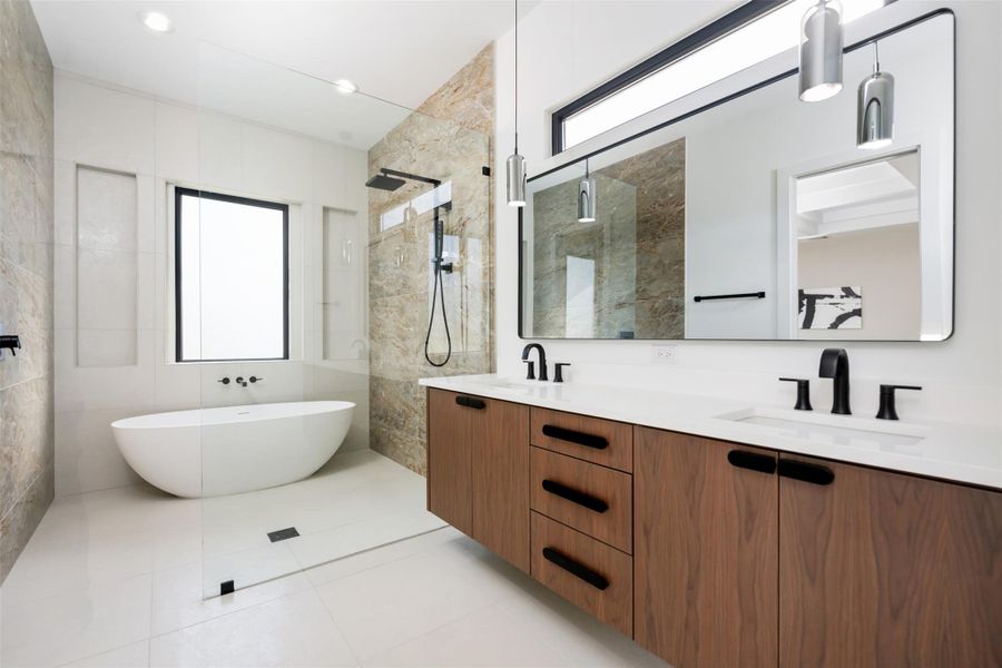 Wet room with stand alone tub and shower, Italian tile, modern vanities, walk-in closet and linen closet. Wet room with stand alone tub and shower, Italian tile, modern vanities, walk-in closet and linen closet.