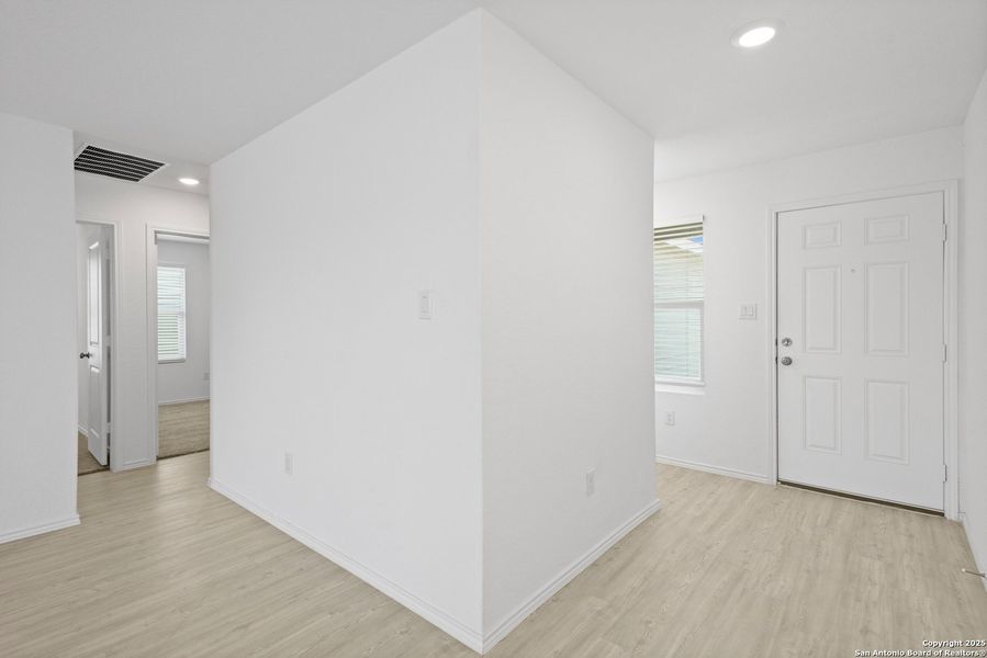 Spacious, unfurnished interior of a new home in Ruby Crossing: Cottage Collection, San Antonio (Image 12).