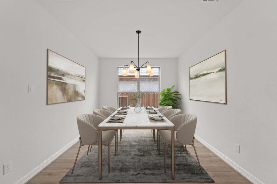 The dining area is a perfect blend of style and functionality, providing an inviting space for memorable meals and gatherings.