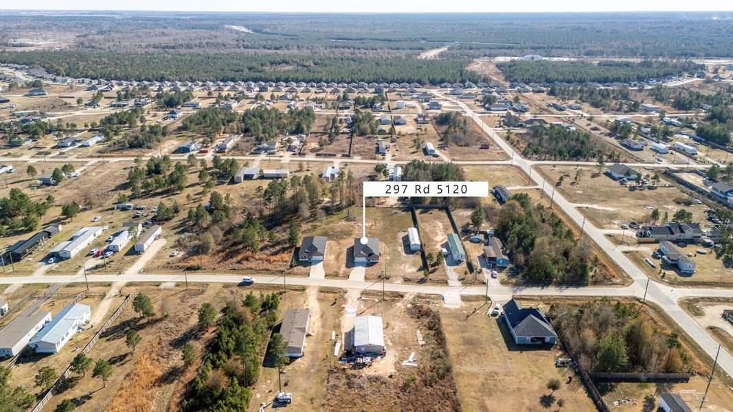 Breathtaking aerial views highlight the expansive landscape and charming neighborhood layout. Breathtaking aerial views highlight the expansive landscape and charming neighborhood layout.