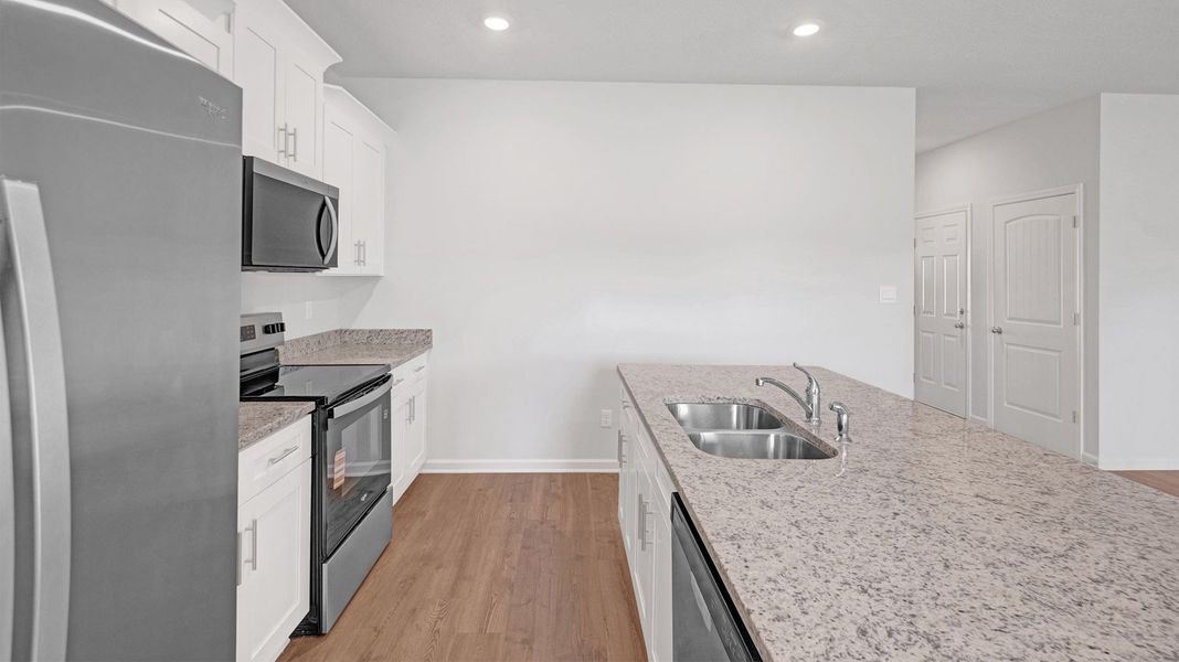 Furnished interior view inside a new home in Huntington Estates, Millington (Image 9).