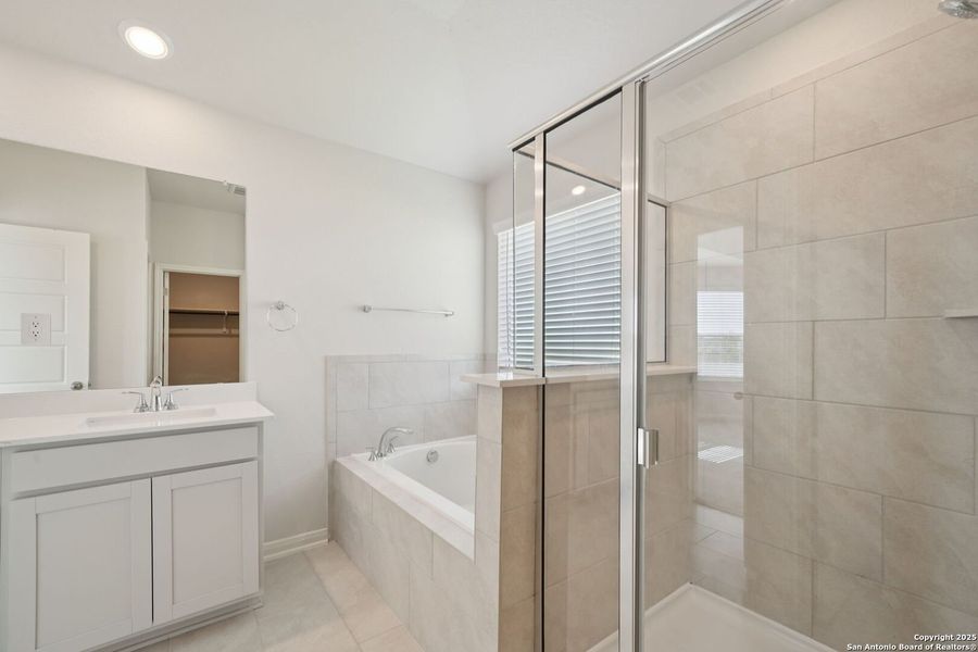 Furnished interior view inside a new home in Estancia Ranch - Premier Series, San Antonio (Image 13).