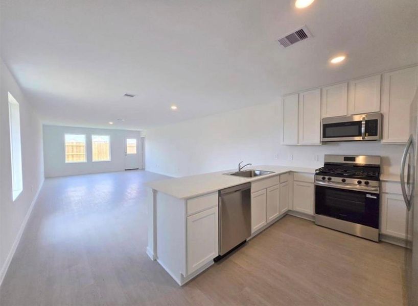 Furnished interior view inside a new home in The Grand Prairie: Cottage Collection, Hockley (Image 6).