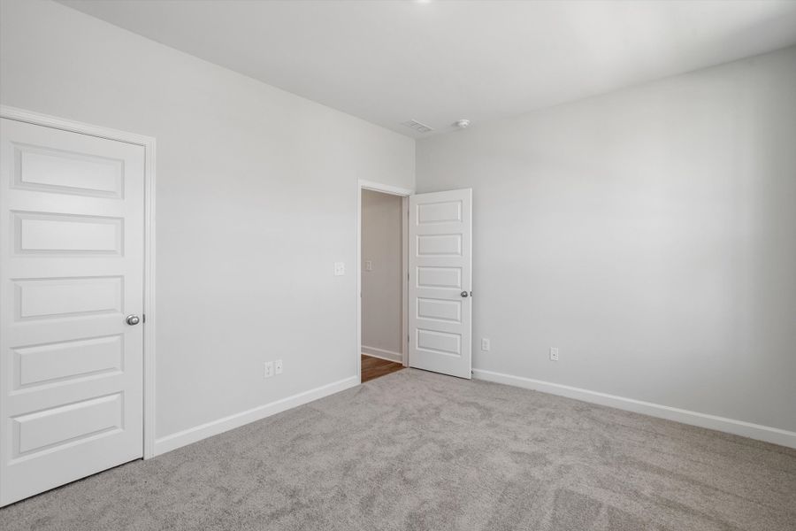 Spacious, unfurnished interior of a new home in Ovation at Sweetbrier, Durham (Image 29).
