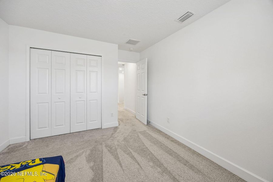 Spacious, unfurnished interior of a new home in Tributary, Yulee (Image 21).