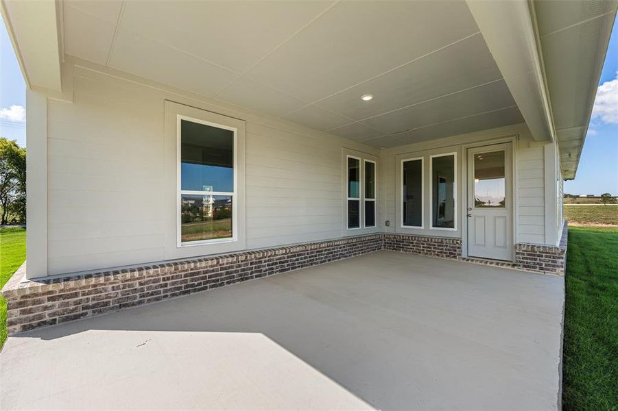 Exterior details and patio area of a home in Fairview Meadows, Rhome (Image 24). Exterior details and patio area of a home in Fairview Meadows, Rhome (Image 24).