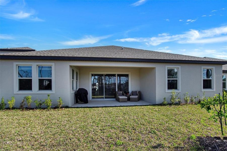 Exterior details and patio area of a home in Legends Preserve - Reserve Series, Daytona Beach (Image 3).