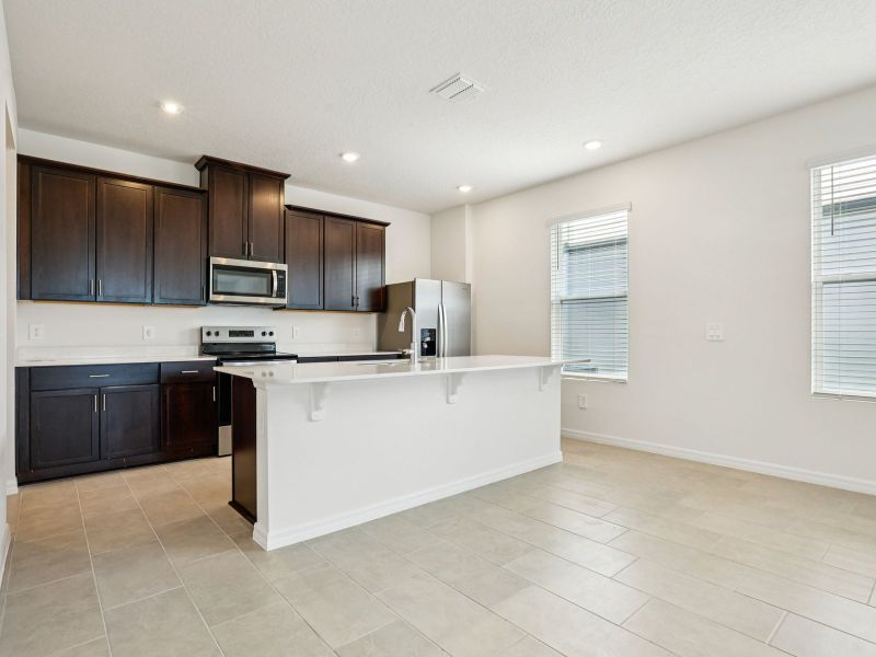 Furnished interior view inside a new home in The Meadow at Crossprairie Bungalows, St. Cloud (Image 4). Furnished interior view inside a new home in The Meadow at Crossprairie Bungalows, St. Cloud (Image 4).