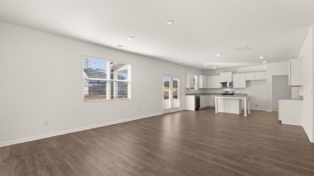 Representative unfurnished interior of a home built from the Mansfield by D.R. Horton in Brooks Station, Dacula (Image 13).