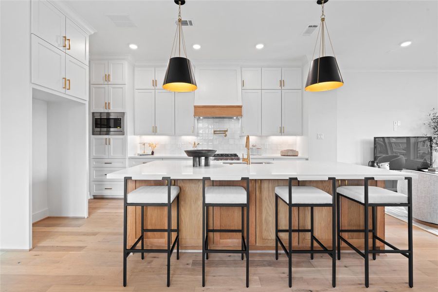 Sleek built-in appliances add a sophisticated touch, merging luxury and modern functionality. Sleek built-in appliances add a sophisticated touch, merging luxury and modern functionality.