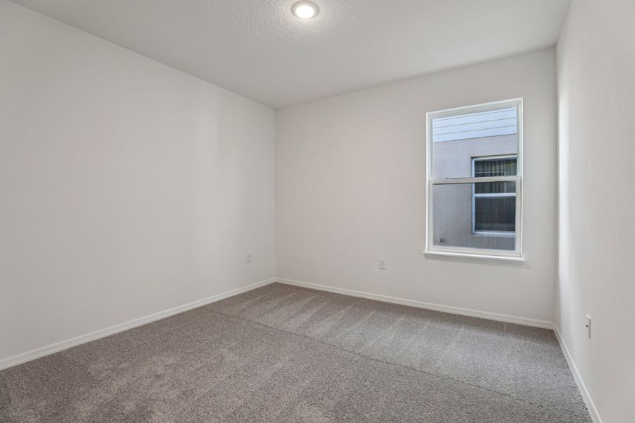 Representative unfurnished interior of a home built from the Vista by Maronda Homes in Heritage Station, Punta Gorda (Image 30).