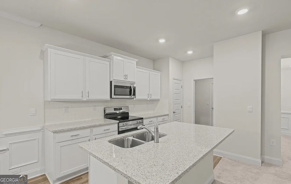 Furnished interior view inside a new home in Canterbury Villas, Carrollton (Image 6).