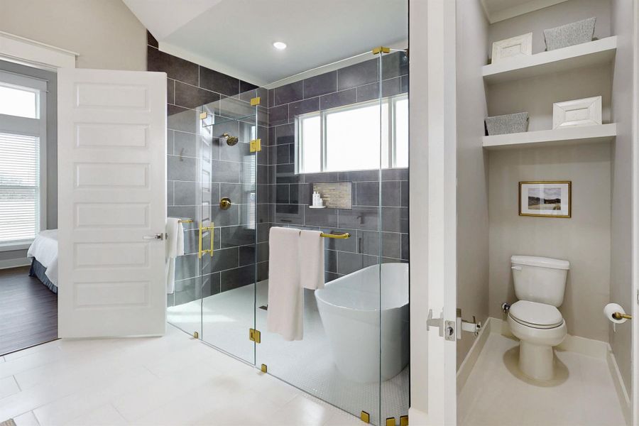 This shower will quickly be one of your favorite features of the house. Splash all you want...This shower is so big you could bathe the whole Fam Damily at the same time :-) Tub is on one end of the enclosed glass, and the shower is on the other end. The builder gets a Gold Star for this design!...