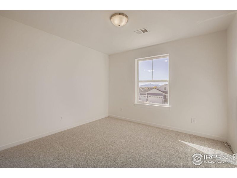 Spacious, unfurnished interior of a new home in RainDance - 60s, Windsor (Image 21).