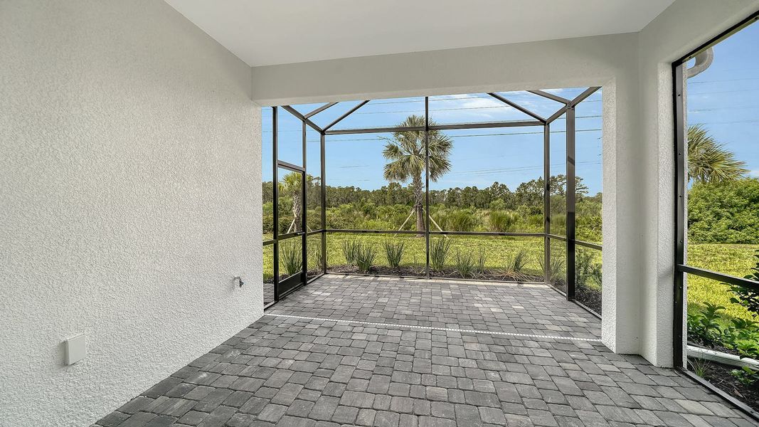 Exterior details and patio area of a home in Windward Real Estate and Homes for Sale in Sarasota, FL - Neal Communities, Lakewood Ranch (Image 2).