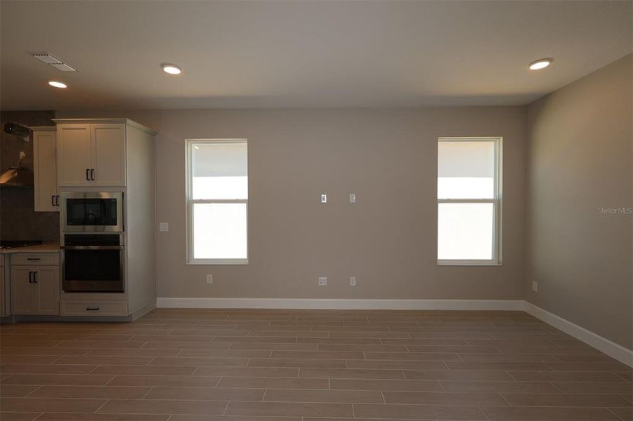 Spacious, unfurnished interior of a new home in Lake Star at Ovation, Winter Garden (Image 19).