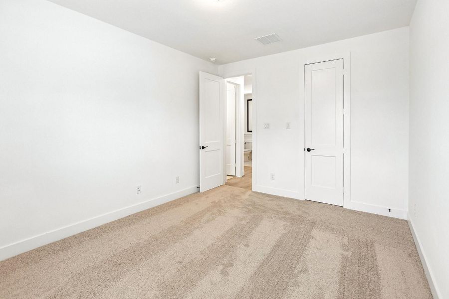 Spacious, unfurnished interior of a new home in The Highlands, Porter (Image 28).