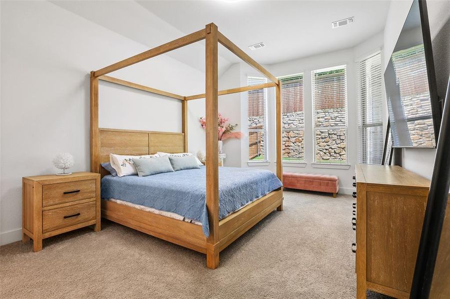Oversized main primary suite with bay windows let the light in Oversized main primary suite with bay windows let the light in